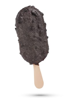 Ice cream on a stick, on a white isolated background. Ice cream covered in dark chocolate with biscuits. Ice cream scoop isolate for inserting into a design or project