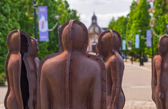 Woolwich, London - 15 May 2023: Detail of the construction of metal men in Assembly public art in Royal Arsenal