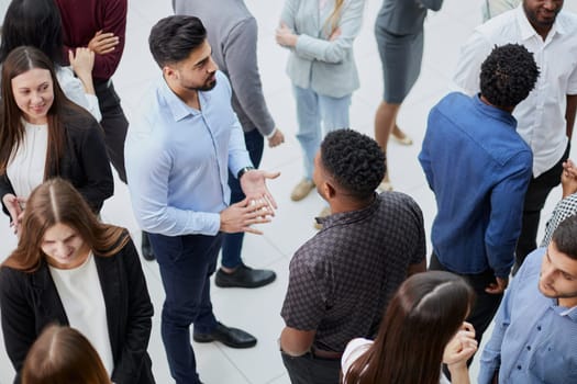 a group of successful young people communicate in a conference room