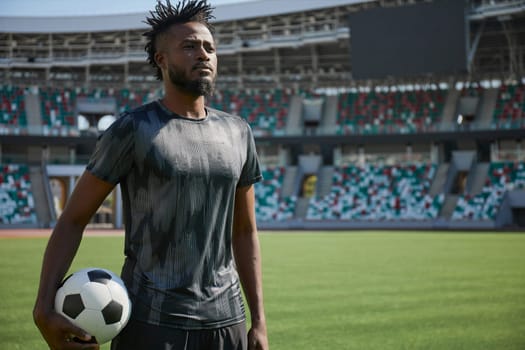 African American soccer player during match inside large stadium