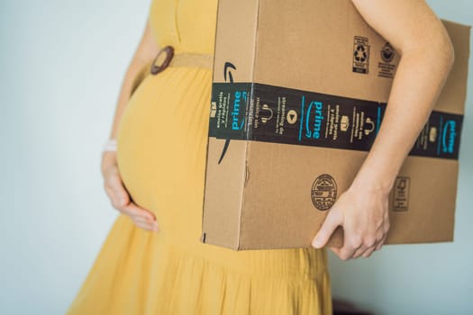 12.21.22, Mexico, Playa del Carmen: A pregnant woman received a package from Amazon. Products for pregnant women and babies on Amazon.