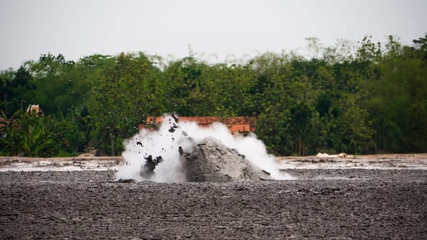 mud volcano with bursting bubble bledug kuwu. volcanic plateau with geothermal activity and geysers, slow motion Indonesia java. volcanic landscape