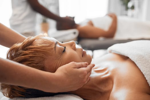 Relax, luxury massage and senior couple together in hotel spa or salon for romantic anniversary weekend. Health, wellness and romance, massage therapy for mature black woman and man in retirement