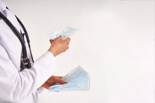 Doctor or nurse recommend to use protective face mask to protect from virus infection