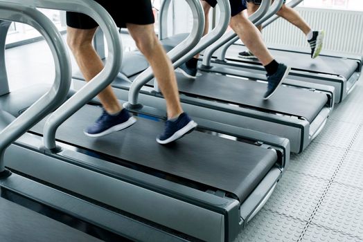 gym shot - people running on machines, treadmill