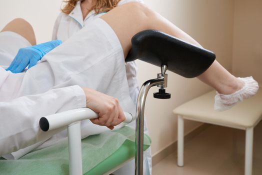 woman patient with gynecologist during the consultation in the gynecological office
