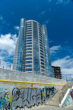 ODESSA, UKRAINE - JUNE 12, 2023: Modern reinforced concrete building on the Black Sea coast in Odessa
