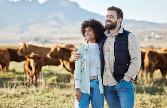 Happy, cow and relax with interracial couple on farm for agriculture, nature and growth. Teamwork, animals and hug with man and black woman in grass field for sustainability, cattle and environment.