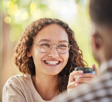 Face, smile or date and a black woman drinking coffee in the park with her boyfriend during summer. Happy, love and dating with a young female smiling at her partner for romance or affection.