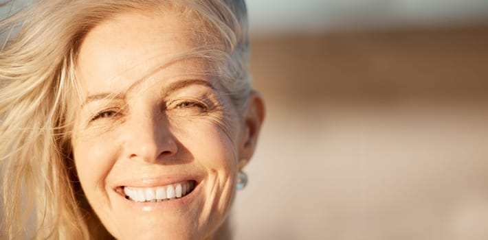 Face, smile and mature woman outdoor with space for freedom, mockup or travel in summer. Portrait and beauty of happy female person in nature for motivation, health and retirement holiday or vacation.