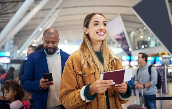 Travel, ticket and smile with woman in airport for vacation, international trip and tourism. Holiday, luggage and customs with passenger in line for airline, departure and flight transportation.