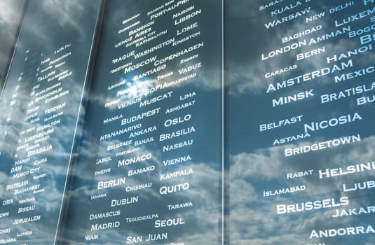 board of list countries with a sky reflection . flight information board at airport. travel concept