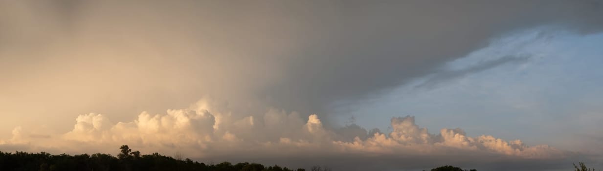 morning mist in the mountains. panorama clouds on the sunset. landscape background