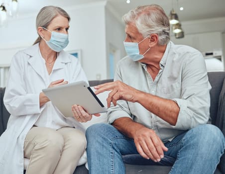 Senior doctor, covid mask and digital tablet patient results in a hospital or wellness clinic. Healthcare consulting, insurance talk or health nurse consultation of elderly people speaking together.