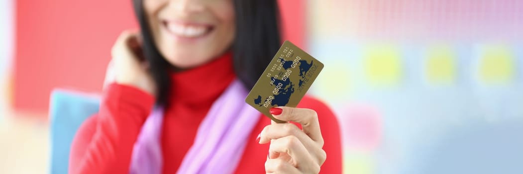 Woman with credit card for shopping in closeup. Shopping discount and sale concept