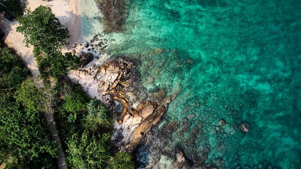 Aerial view of an emerald green sea and big foaming waves. Indian Ocean. Dikwella beach. Sri Lanka. High quality photo