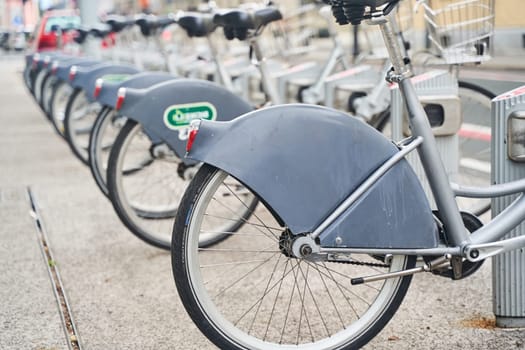 Ljubljana, Slovenia - October 10, 2022: Bicycle parking for rent in Ljubljana. Lettering Bikie High quality photo