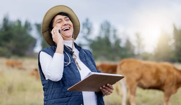 Veterinarian, phone call or happy woman laughing on farm to check cattle livestock wellness or animals environment. Field, joke or funny senior person networking to protect cows healthcare on barn.
