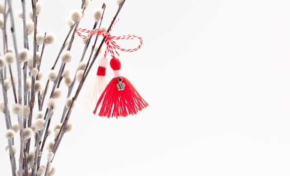 Martenitsa, Baba Marta, Martisor With Willow Twig on White Background. Traditional Symbol of Holiday March 1. Grandma Marta Day Celebration In Romania,Bulgaria,Moldova. Copy Space For Text.Horizontal.