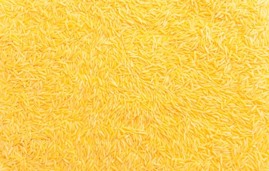 Background texture of dried risoni, orzo pasta. Italian cuisine. Durum wheat semolina pasta for risotto and salads. Orzo pasta of rice shape. Closeup, horizontal plane, top view, flat lay