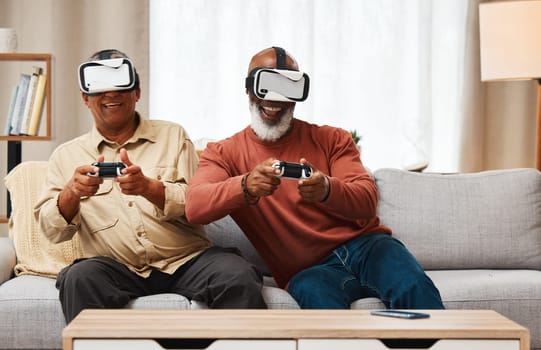 Friends, virtual reality and senior men gaming in home on sofa in living room while laughing. 3d vr, metaverse gamer and smile of happy retired people playing fun futuristic games with controller