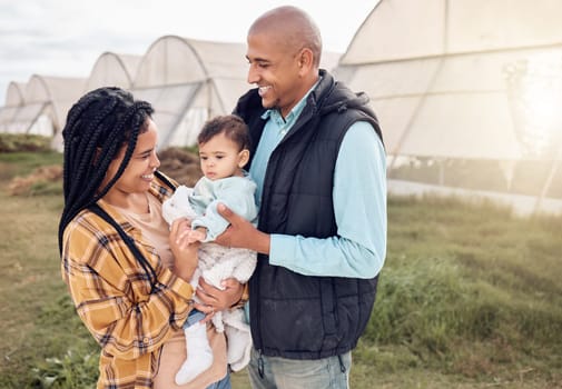 Mom, father and baby with smile at farm, outdoor and happy for infant kid, growth and sustainable small business. Black family, child and excited for farming sustainability with love by greenhouse.