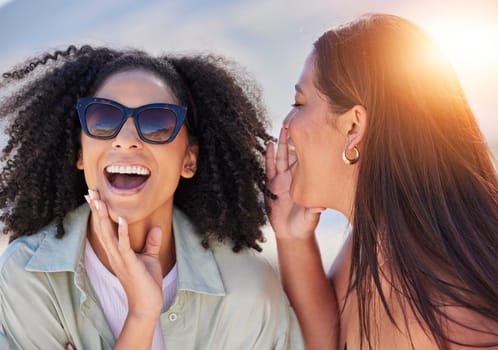 Girl friends, whisper and happy communication of a woman with a secret laughing outdoor. Lens flare, friend conversation and summer holiday travel of people talking about a gossip story on vacation.