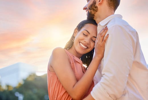 Couple, smile and hug for love, support or care for relationship bonding or embrace together in the outdoors. Happy woman hugging man embracing romance and smiling in happiness for fun quality time.