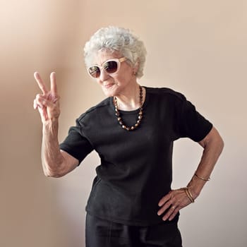 Shot of a cool senior woman at home.