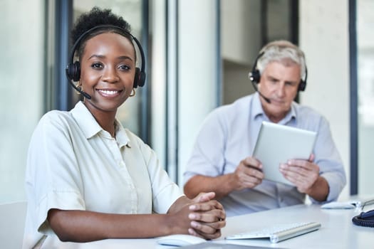 Black woman, portrait and call center work of a employee with telemarketing and contact us job. Phone consultation, African female person and web support in office with staff working on online desk.