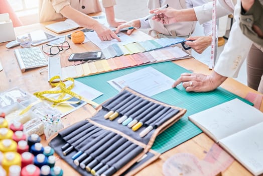 Planning, teamwork and fashion designer hands in creative project, collaboration and textile industry. Startup, sketch and studio, workshop or manufacturing people ideas, art vision and color palette.