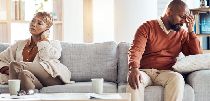 Fight, divorce and sad with old couple on sofa for problem marriage, mental health and difficult. Conflict, depression and mental health with old man and woman in living room for depression and angry.