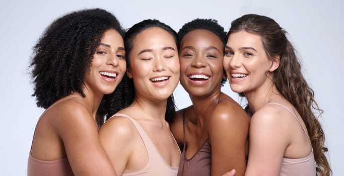 Face portrait, beauty and group of women in studio on gray background. Natural cosmetics, skincare and diversity of happy female models, friends or girls in makeup posing for self love or empowerment.