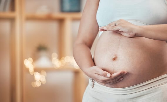 Pregnant, stomach and woman frame her belly in maternity ready for motherhood to be a parent. Motherhood, abdomen and pregnancy with a female ready to have a family and babies at home.