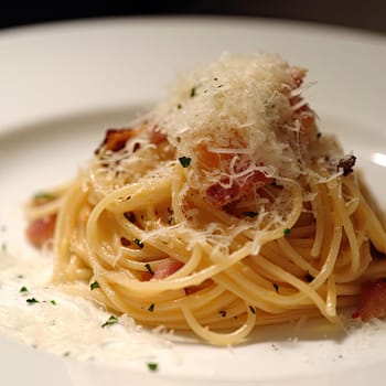 Spaghetti Carbonara with bacon and parmesan cheese on white plate (ID: 001310)