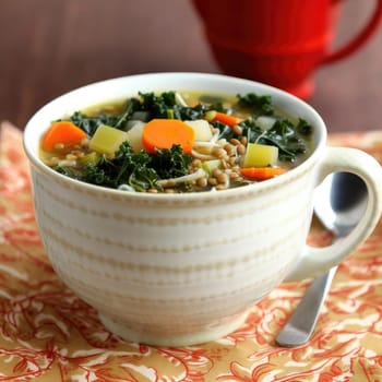 Vegetable soup with lentils, and kale in a bowl (ID: 001452)