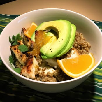 Healthy breakfast with quinoa, avocado, and orange on white plate (ID: 001542)