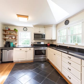 Kitchen with white cabinets and black granite top (ID: 001624)