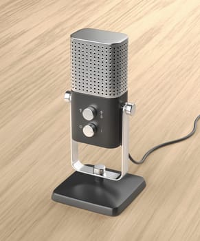 Modern studio microphone on wooden desk