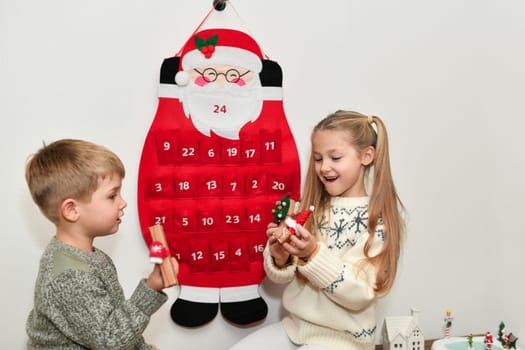 The kids find gifts Felt santa claus advent calendar