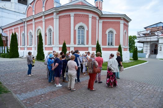 Kolomna, Russia - May 30, 2023: A group of tourists on the territory of the Kolomna Kremlin