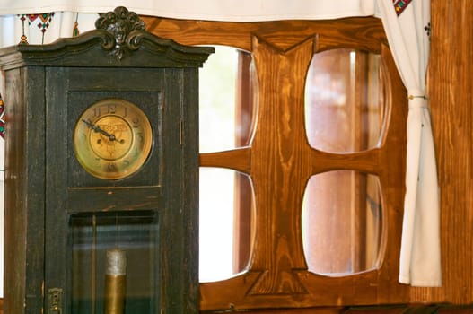 a mechanical or electrical device for measuring time, indicating hours, minutes