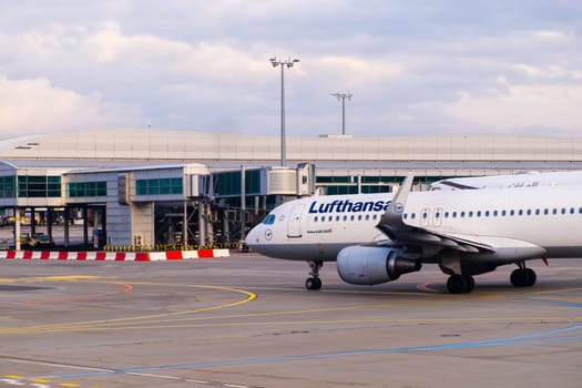 Lufthansa airplane getting ready to fly at the airport at sunset, June 2023, Prague, Czech Republic