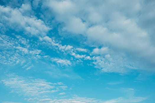 Beautiful white fluffys clouds sky background with blue sky background