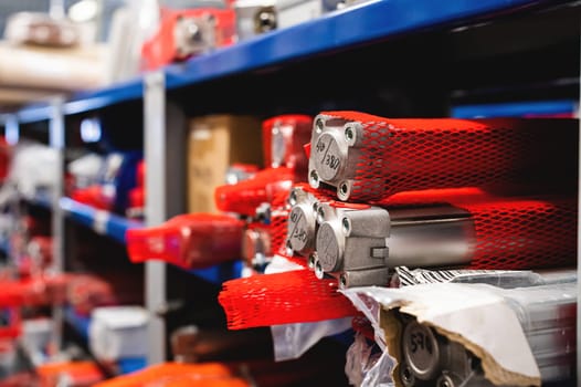 A large number of pneumatic equipment in the production storage warehouse. Pneumatic control cylinders.