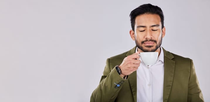Mockup, coffee and Asian man with peace, relax and happy with guy against a grey studio background. Japan, male and gentleman with tea, peace and product placement with beverage, calm and backdrop.