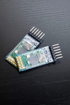 Two small green boards for an electronic device
