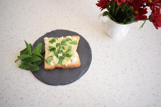 Healthy toast with cottage cheese and fresh village butter.