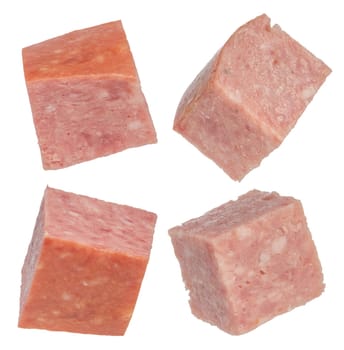 Smoked sausage isolate cut into squares. Salami sausage cubes on a white isolated background. For inserting into a design, project or product label creation