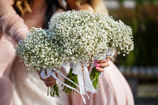 Bouquets of bridesmaids holding bouquets in the center